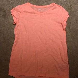 Girl’s orange heathered orange v neck tee